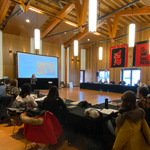 ARENA participants seated around a rectangular table in a conference room.