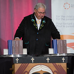 Murray Sinclair with the Truth and Reconciliation Commission's 6-volume Final Report including the 94 Calls to Action.