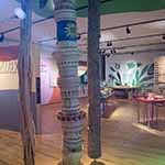 Abenaki baskets piled one on top of another to look like a tree trunk.