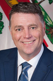 Hon. Dennis King